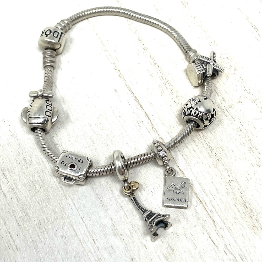 PANDORA  “travel” themed 6 charm sterling silver bracelet